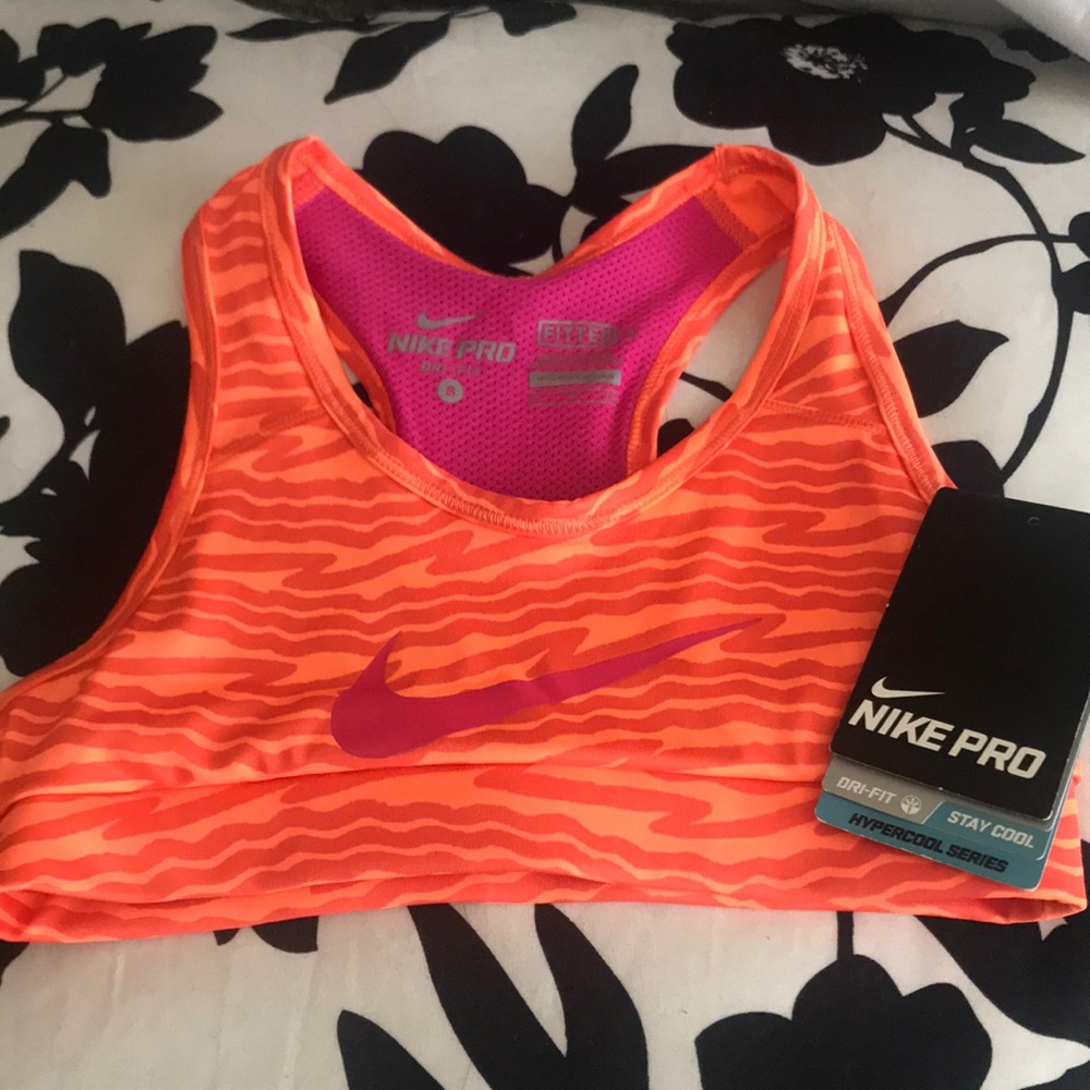Orange and magma pink sports Nike sports bra